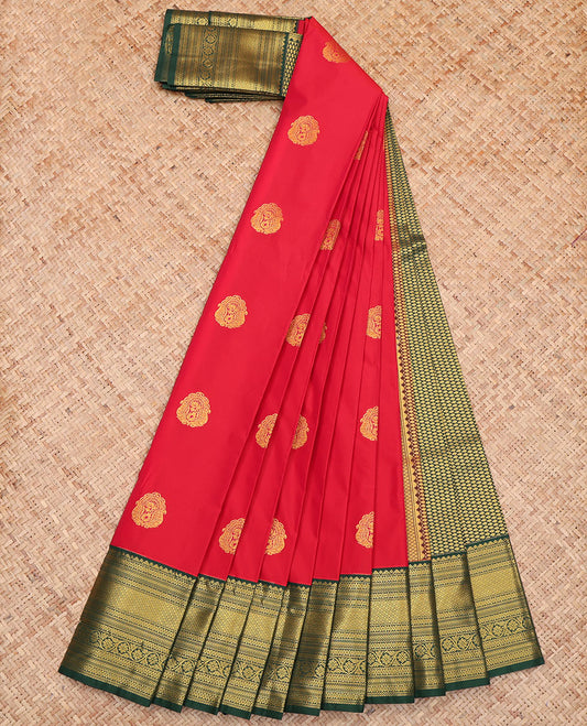 Red Budget Silk Saree, Elegantly Decked Up with Zari Buttas All Over Its Body, Complemented by a Contrast Traditional Zari Design Border, a Grand Pallu of Jaal Design, and Paired with a Contrast Blouse