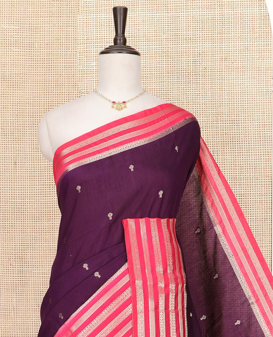 Dark Purple Assam Silk Saree Beautified with Zari Buttas, Complemented by Contrast Zari Border Featuring Traditional Zari Designs, a Gleaming Pallu of Zari Stripes, and Paired with a Contrast Blouse