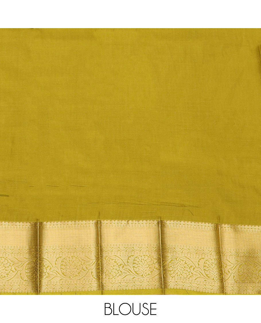 Apple Red Budget Silk Saree Features Zari Designs All Over Its Body, Highlighted with a Contrast Traditional Zari Design Border, Pallu Steeped with Big Paisleys, and a Contrast Zari-Bordered Blouse