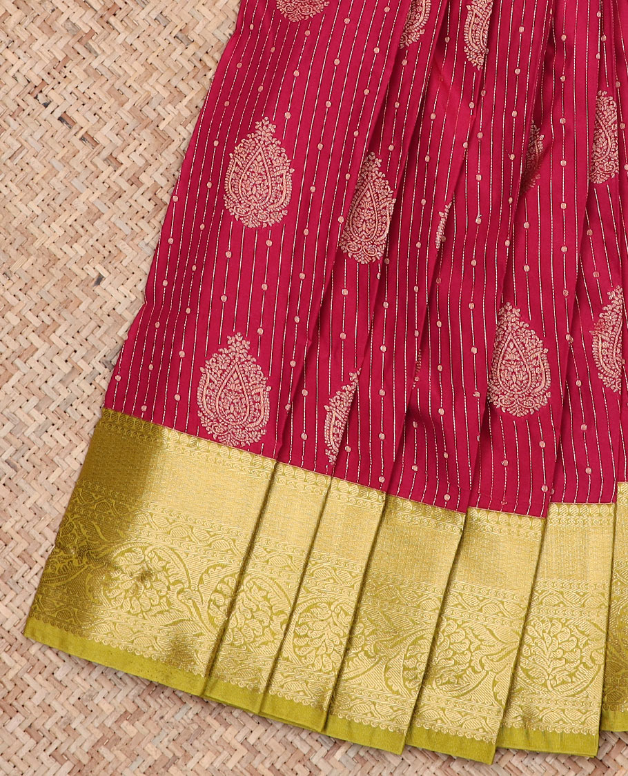 Apple Red Budget Silk Saree Features Zari Designs All Over Its Body, Highlighted with a Contrast Traditional Zari Design Border, Pallu Steeped with Big Paisleys, and a Contrast Zari-Bordered Blouse