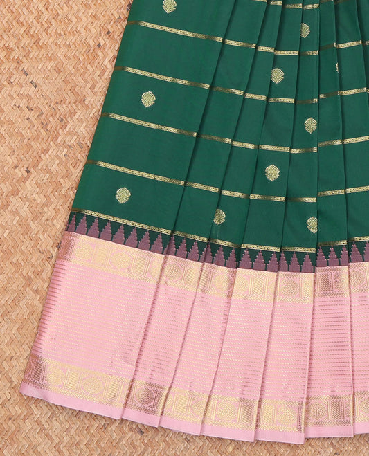 Green Budget Silk Saree, Prettified with Zari Buttas and Zari Stripes All Over Its Body, Complemented by Contrast Traditional Zari Design Temple Border, Subtly Sparkled Pallu, and Paired with a Contrast Blouse