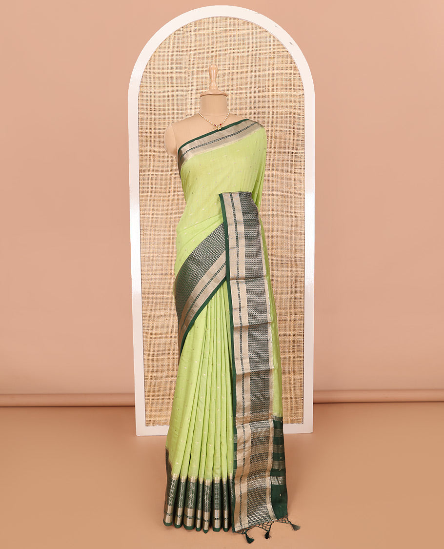 Pista Green Assam Silk Saree Adorned with All-Over Buttas, Featuring a Contrast Temple Border of Butta Enclosed Checked Design, a Pallu Steeped with Zari Stripes, and Paired with a Contrast Zari Design Blouse