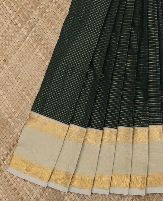 Deep Green Budget Silk Saree Crafted with Dotted Zari Stripes, Highlighted with a Contrast Traditional Zari Design Border, Subtle Pallu, and Paired with a Contrast Blouse