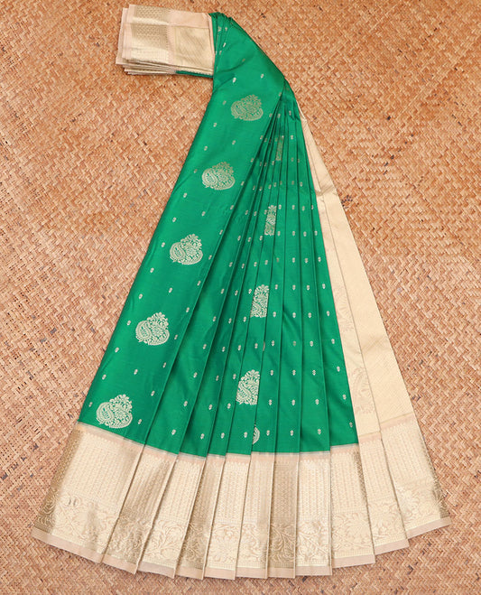 Green Budget Silk Saree, Styled with Zari Buttas on Its Body, Complemented by a Contrast Traditional Zari Design Border, Pallu of Paisley and Strip Designs, and Paired with a Contrast Blouse