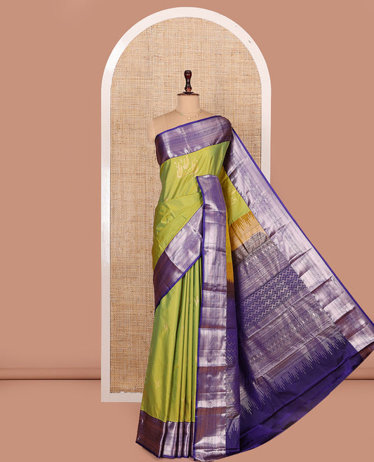 Green Budget Silk Saree, Prettied with Zari Buttas All Over Its Body, Complemented by a Contrast Border of Traditional Designs Woven in Zari, Pallu Detailed with Chevron Designs, and Paired with a Contrast Blouse