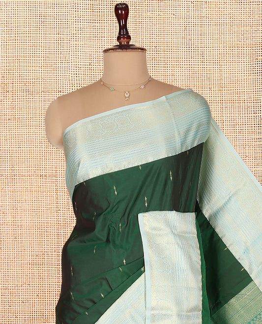 Green Budget Silk Saree, Mesmerized with Zari Buttas on Its Body, Complemented by a Contrast Traditional Zari Design Border, Grand Jaal Pallu, and Paired with a Contrast Blouse