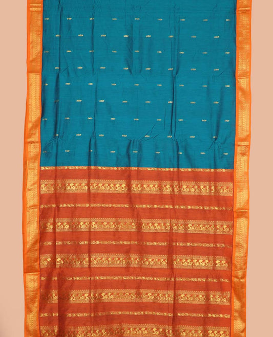 Peacock blue buttas nine-yard cotton saree, contrast traditional zari border, and pallu steeped with traditional motifs