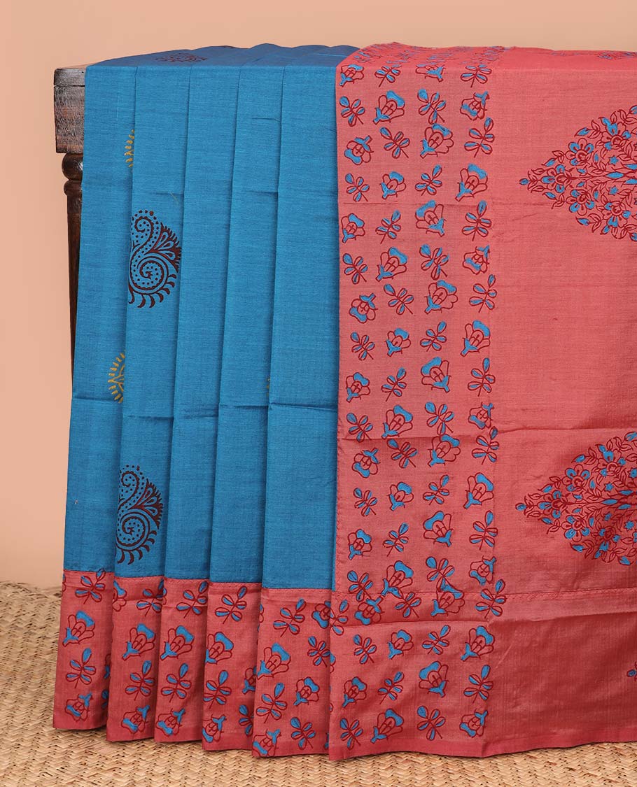 Blue unique motifs printed poly cotton saree, contrast floral printed border, and floral printed pallu