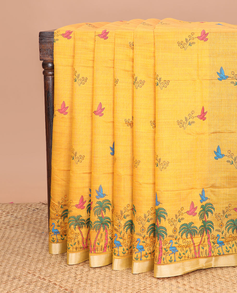 Yellow floral and bird buttas printed chirala cotton saree, bavanji border, and contrast bird print pallu