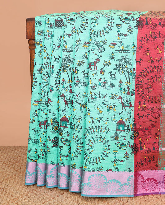 Turquoise warli village printed Andhra cotton saree, zari floral border, and contrast warli printed pallu