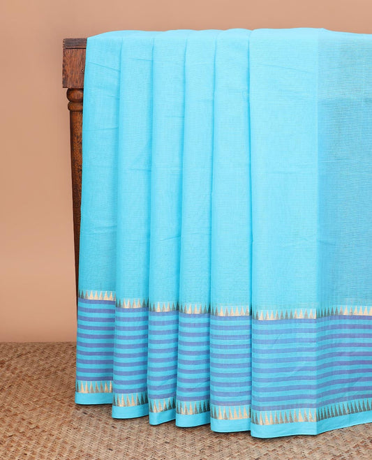 Blue plain Mangalagiri cotton saree with temple zari border of horizontal stripes, striped pallu, and a contrast kalamkari floral printed blouse