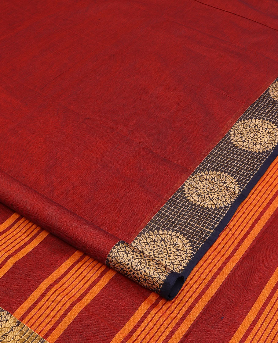 Maroon plain nine-yard cotton saree, contrast chakram motifs border, and pallu of stripes