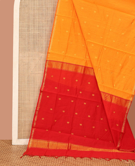 Orange Maheshwari Cotton Saree, Delicately Designed with Flower Buttas All Over Its Body, Subtly Woven Piping Border, Captivating Contrast Pallu Steeped with Buttas, and Paired with a Contrast Blouse