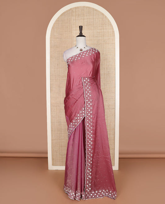 Pink stone embedded designer saree, floral enclosed jaal embroidered scallop border