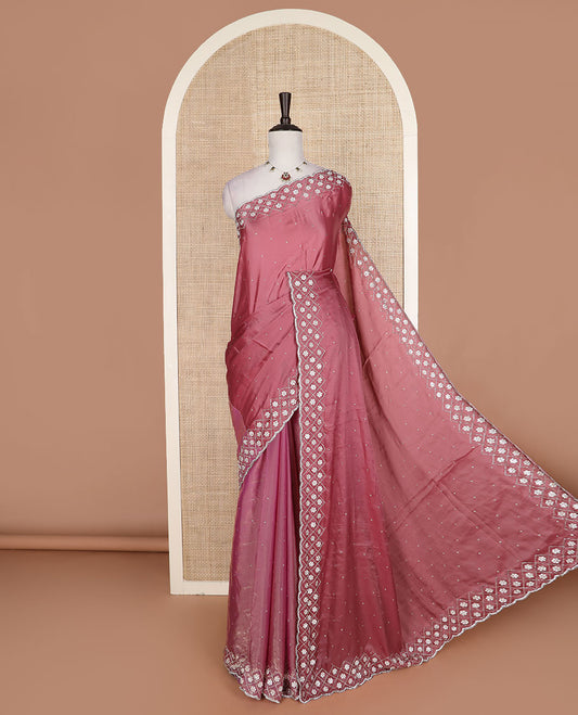 Pink stone embedded designer saree, floral enclosed jaal embroidered scallop border