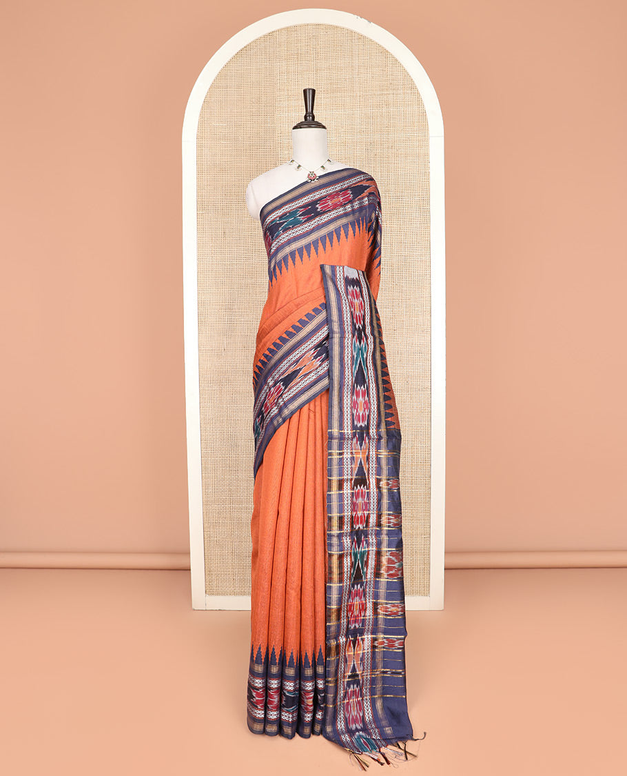 Orange Plain Dupion Silk Saree, Highlighted by a Contrast Temple Border of Geometric Patterns and Ikkat Weave, Pallu Depicting Floral Ikkat Designs, and Paired with a Contrast Blouse