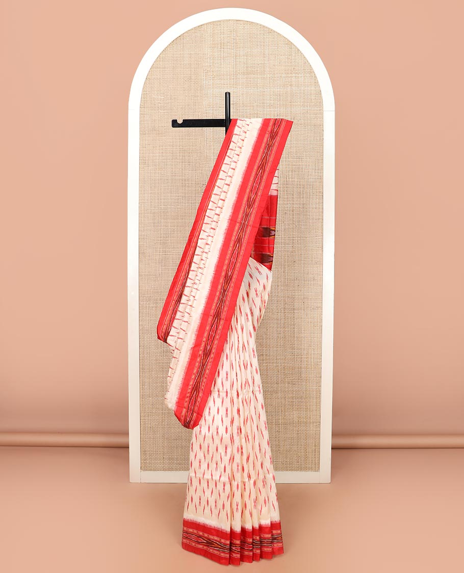 Cream Ikkat Silk Saree with Buttas Across the Body, Highlighted by a Contrast Ikkat-Textured Border, and Pallu Features Stripes and Ikkat Texture