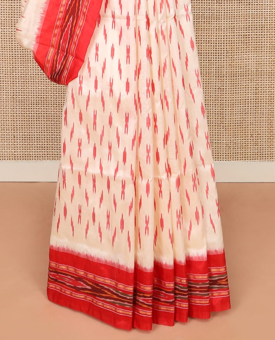 Cream Ikkat Silk Saree with Buttas Across the Body, Highlighted by a Contrast Ikkat-Textured Border, and Pallu Features Stripes and Ikkat Texture
