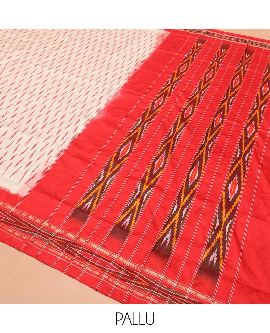 Cream Ikkat Silk Saree with Buttas Across the Body, Highlighted by a Contrast Ikkat-Textured Border, and Pallu Features Stripes and Ikkat Texture