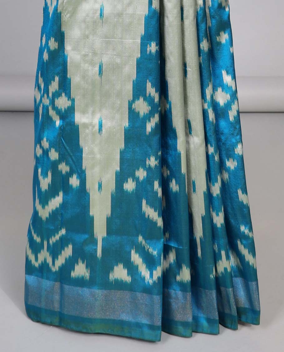 Purple geomentric design ikkat silk saree with contrast striped border & striped design pallu
