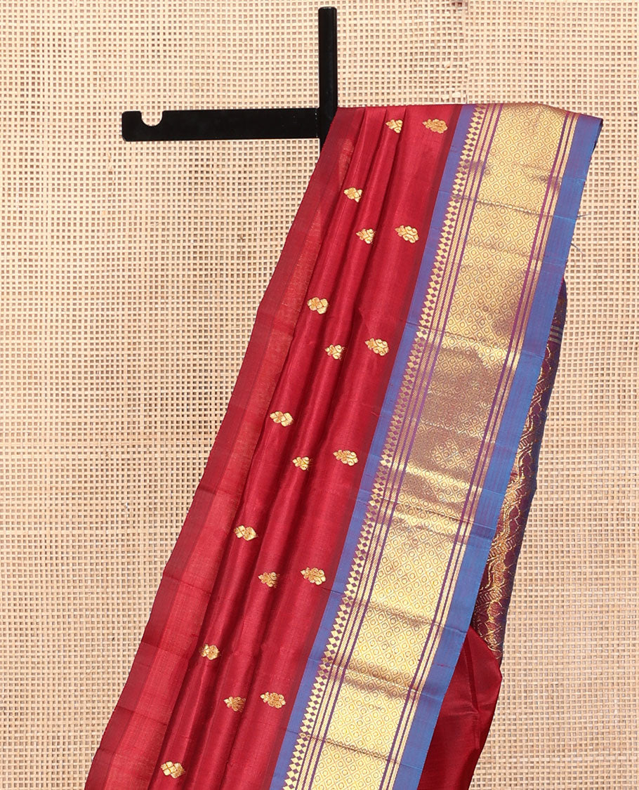 Red Kanchipuram Silk Saree, Decked Up with Zari Buttas, a Contrast One-Sided Border of Panner Sombu, Banaras, and Mayil Kann, Zari Design Pallu, and No Blouse