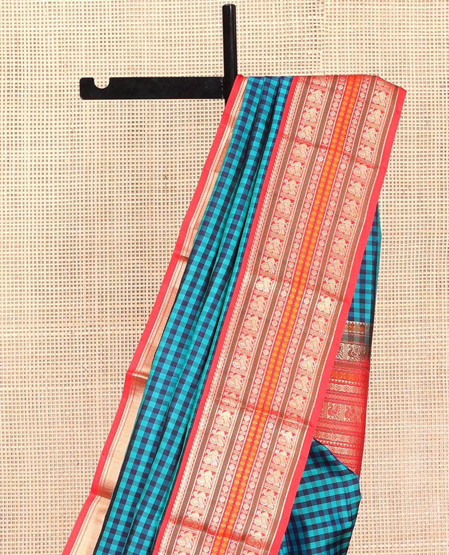 Blue Kanchipuram Silk Saree, Finely Crafted with Kasa-Kasa Checks, Contrast Border of Manga Mokku, Mayil, Poun and Kamalam, Pallu of Traditional Designs, and Contrast Blouse