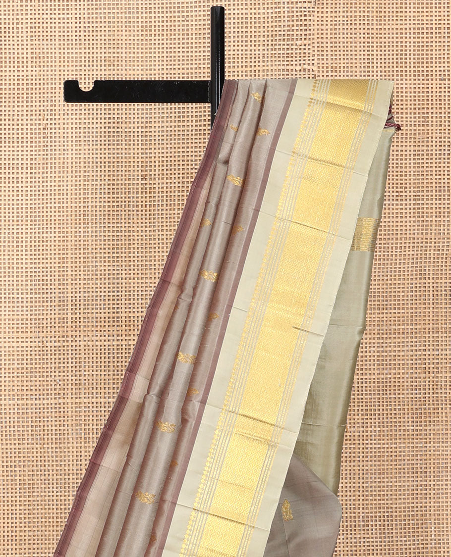 Grey Kanchipuram Silk Saree, Woven with Zari Buttas, a Contrast One-Sided Border of Panner Sombu, Banaras, Muthu, and Mayil Kann Designs, a Zari Design Pallu, and No Blouse