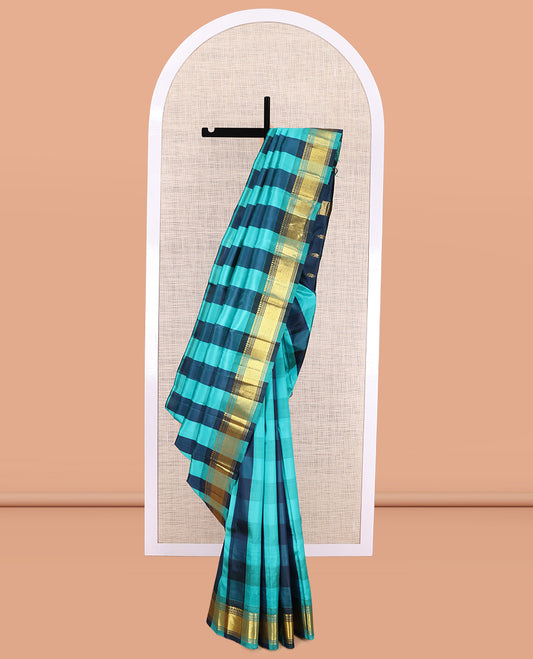 Blue Checked Kanchipuram Silk Saree, a Zari One-sided Border of Paneer Sombu, Banaras, Muthu, and Mayil Kann Designs, Pallu of Zari Designs, and No Blouse
