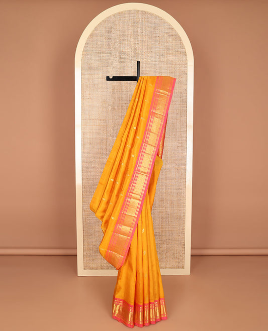Orange buttas kancheepuram silk saree with contrast intricate zari design border & floral zari design pallu