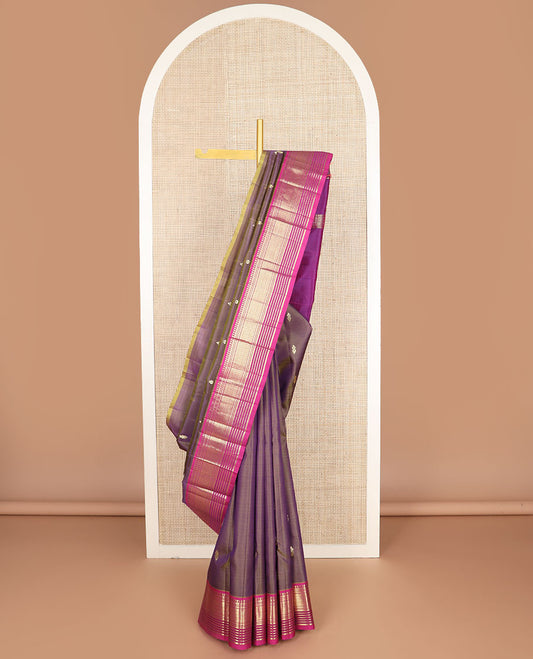 Purple zari buttas kanchipuram silksaree, contrast one-sided border of paneer sombu,banaras,muthu & jaal design & zari design pallu