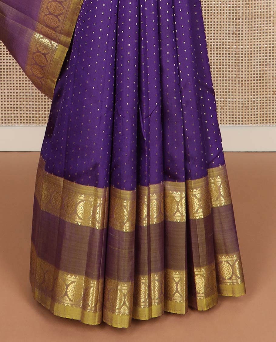 Violet buttas kanchipuram silk saree, contrast rettai pettu one-sided zari border of rekku,banaras & chakram & floral design pallu
