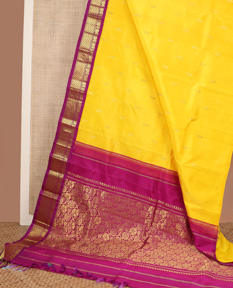 Yellow zari buttas Kanchipuram silk saree, contrast korvai border of mayil & geometric patterns & floral jaal pallu