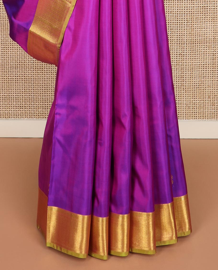 Rani pink zari buttas Kanchipuram silk saree, contrast traditional zari border, and kamalam designs steeped pallu