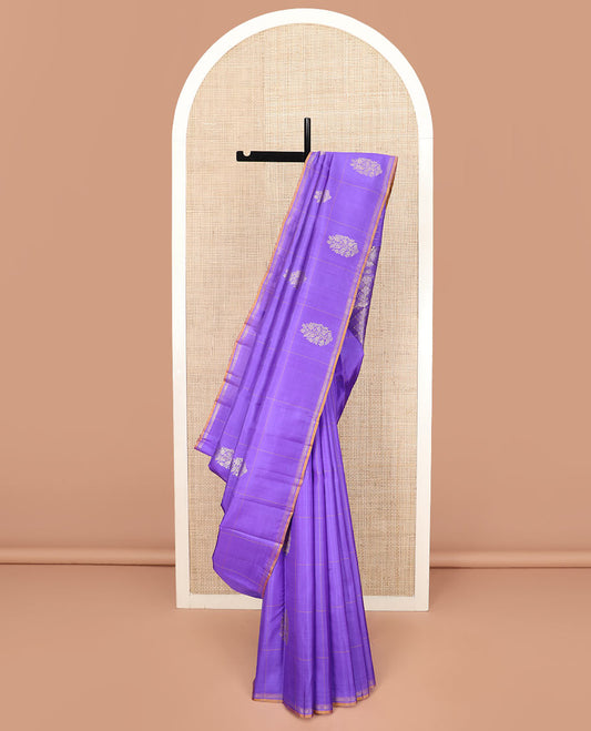 Lavender Kanchipuram Silk Saree Featuring Buttas Enclosed Checks, Adorned with a Contrast Piping Border, Zari Elevated Pallu of Jaal Design, and Paired with a Matching Checked Blouse