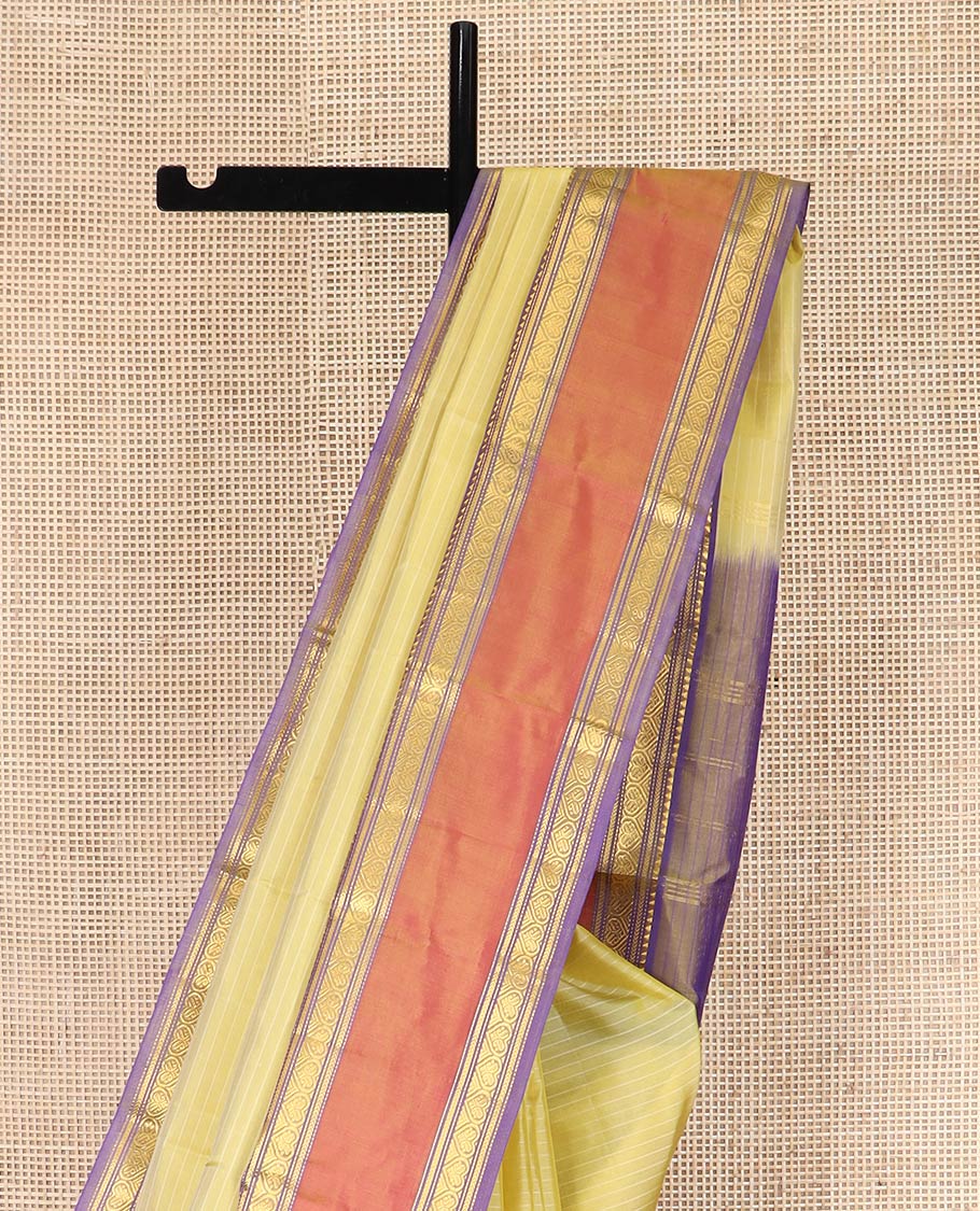 Pale Yellow Kanchipuram Silk Saree Embellished with Vazhaipoo Stripes, Complemented by Contrast Rettai Pettu Border of Rekku, Kathir, Muthu, and Jada Nagam Designs, Zari Woven Pallu, and Paired with a Contrast Blouse