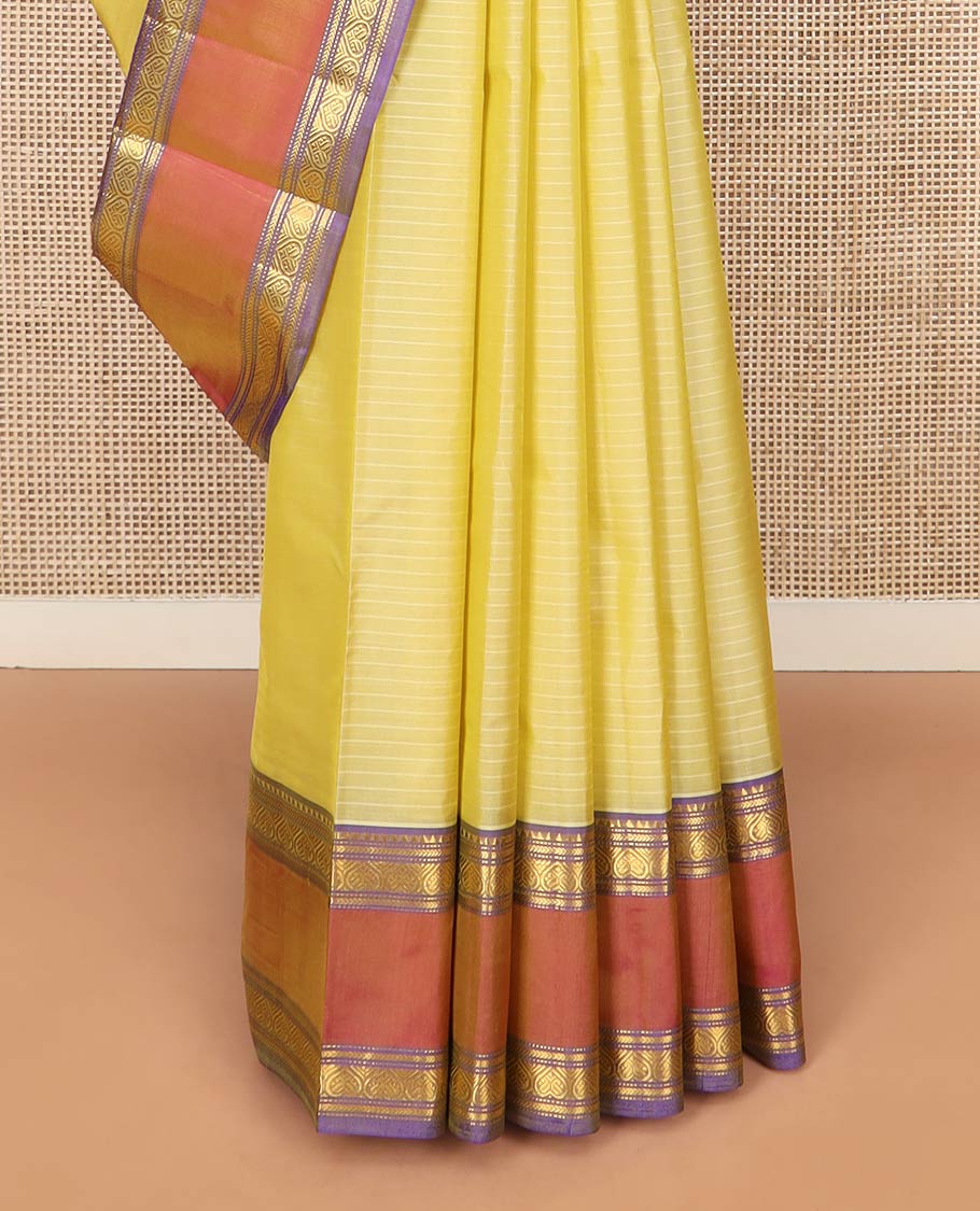 Pale Yellow Kanchipuram Silk Saree Embellished with Vazhaipoo Stripes, Complemented by Contrast Rettai Pettu Border of Rekku, Kathir, Muthu, and Jada Nagam Designs, Zari Woven Pallu, and Paired with a Contrast Blouse
