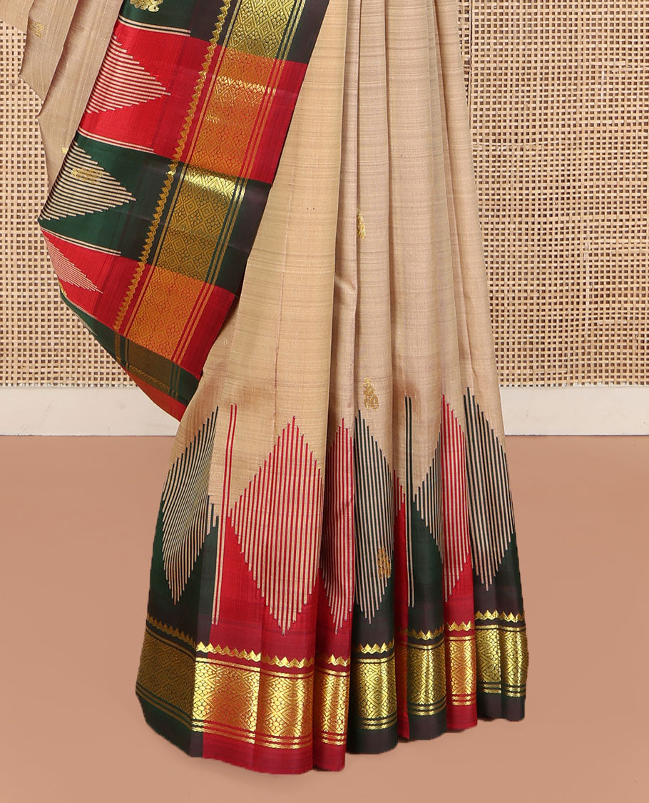 Sandal Kanchipuram Silk Saree, Elevated with Zari Buttas on Its Body, Complemented by a Contrast One-Sided Temple Border of Thilakam Mokku, and Jaal Designs, Pallu Depicts Zari Designs, and Comes Without a Blouse