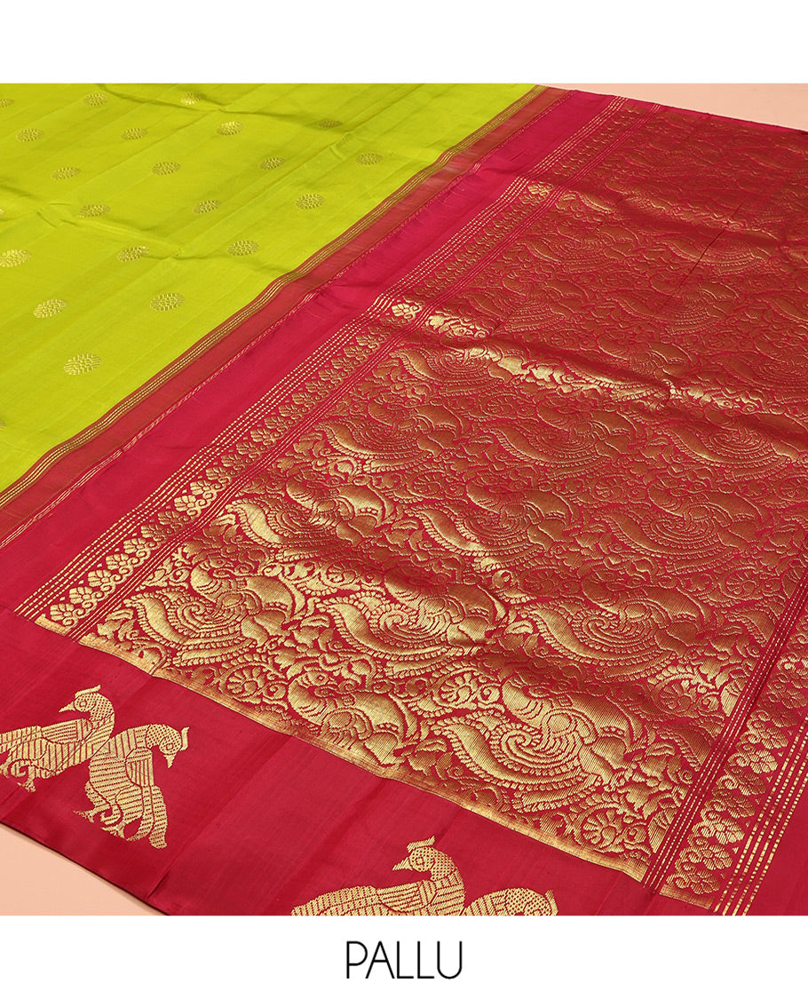 Green Kanchipuram Silk Saree, Styled with Chakram Buttas, Complemented by a Contrast One-Sided Korvai Border of Mayil and Chakram Designs, Pallu Steeped with Mayil Designs, and No Blouse