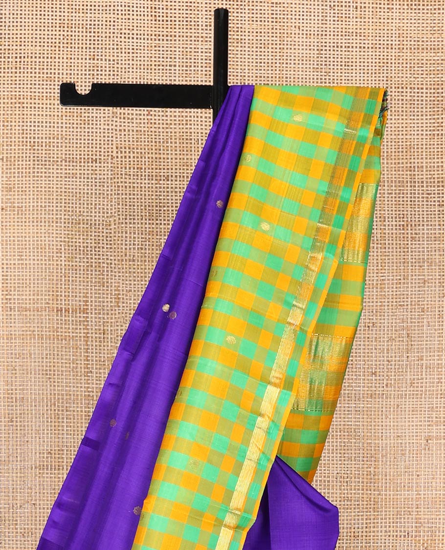 Blue kancheepuram silk saree with zari buttas, contrast one-sided thazampoo reku checked border of zari buttas & checked pallu of zari designs