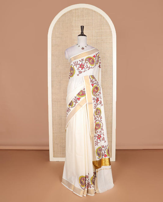 Cream floral, and paisley printed Kerala cotton saree, bavanji border, and floral, and paisley printed pallu