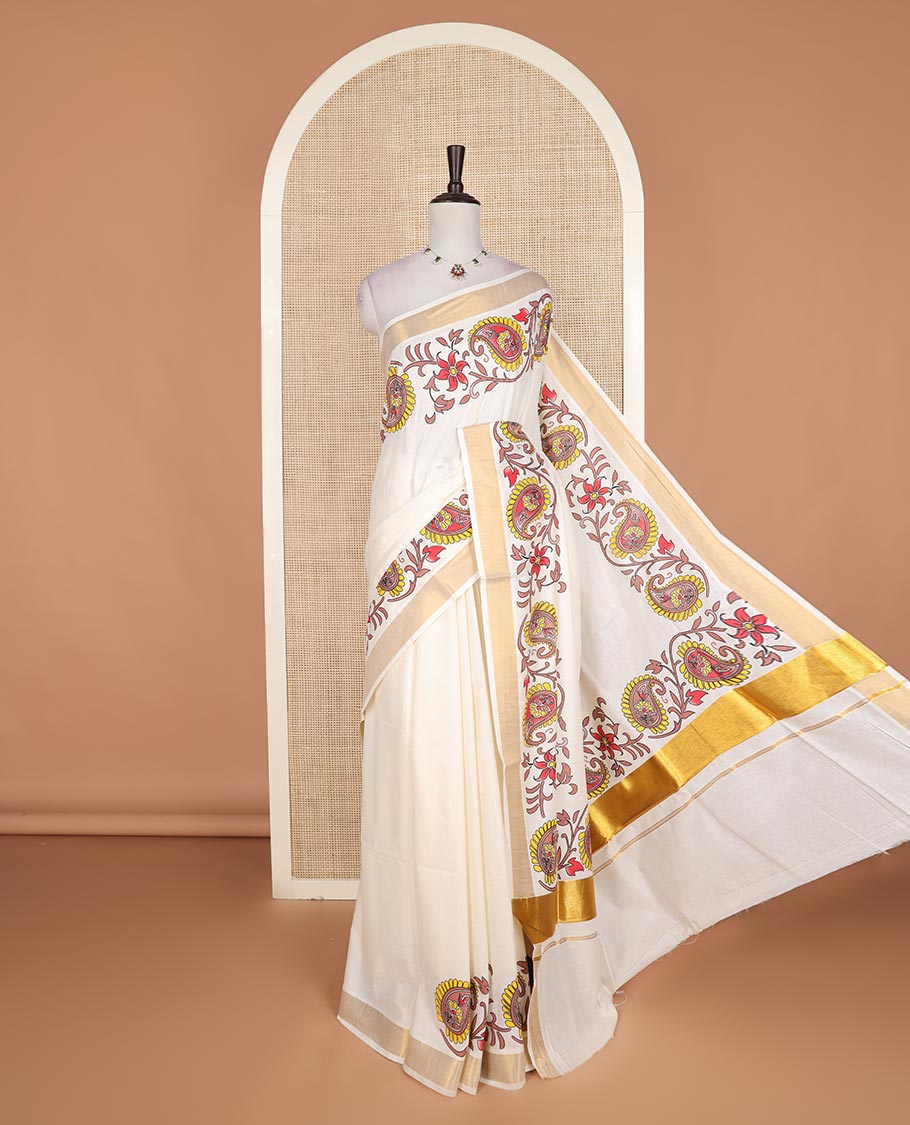 Cream floral, and paisley printed Kerala cotton saree, bavanji border, and floral, and paisley printed pallu