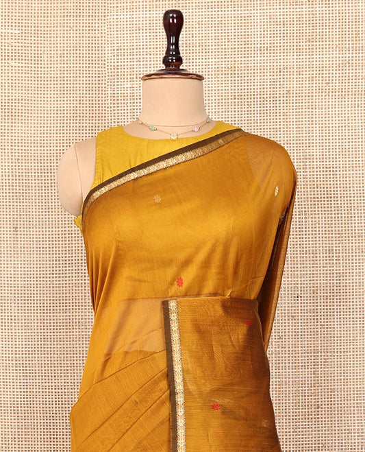Mustard Maheshwari Cotton Saree, Accentuated with Star Buttas on Its Body, Highlighted by Zari Piping Border of Star Motifs, Captivating Contrast Pallu Steeped with Buttas, and Paired with a Contrast Blouse