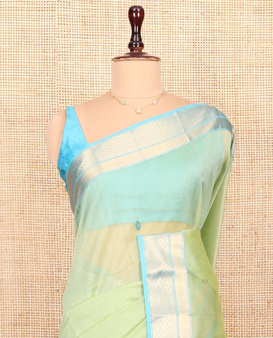 Green Maheshwari Cotton Saree, Beautified with Flower Buttas All Over Its Body, Complemented by a Contrast Zari Traditional Design Border, Pallu Steeped with Flower Designs, and Paired with a Contrast Blouse
