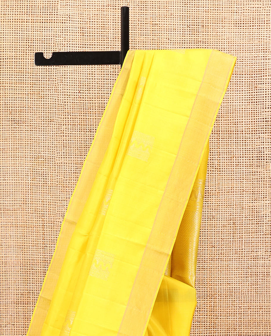 Yellow Mayuri Soft Silk Saree, Subtly Sparkled with Zari Designs All Over Its Body, Highlighted by Zari Border, Pallu of Ara Maadam Designs, and Paired with a Matching Blouse