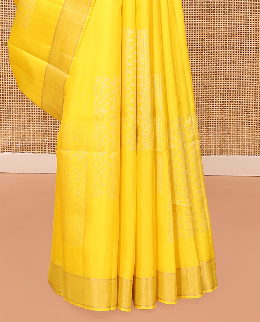 Yellow Mayuri Soft Silk Saree, Subtly Sparkled with Zari Designs All Over Its Body, Highlighted by Zari Border, Pallu of Ara Maadam Designs, and Paired with a Matching Blouse