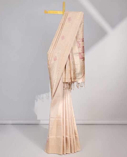Cream small buttas soft silk saree with self zari design border & pallu of argyle pattern
