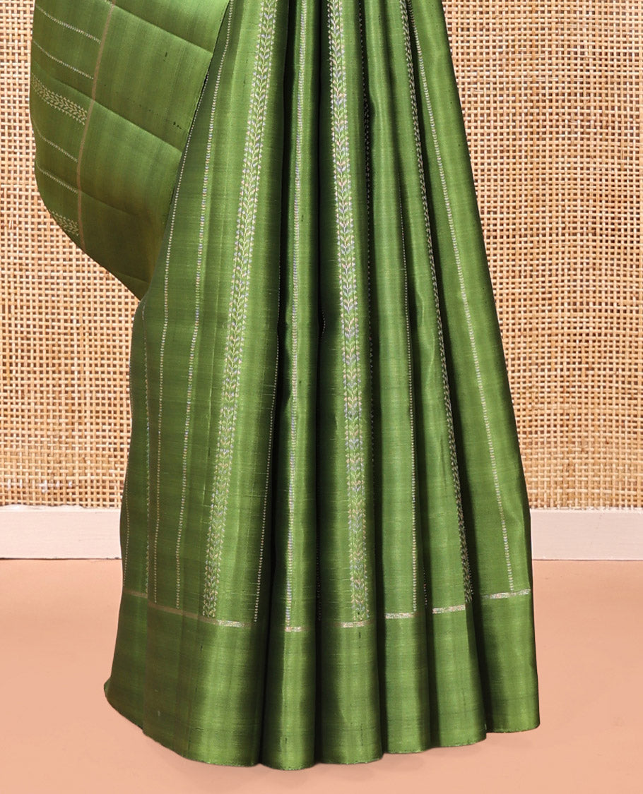 Green Mayuri Soft Silk Saree, Subtly Decked Up Zari Stripes All Over Its Body, Highlighted by Self-Border, Pallu Steeped with Elephant Motifs, and Paired with a Matching Blouse