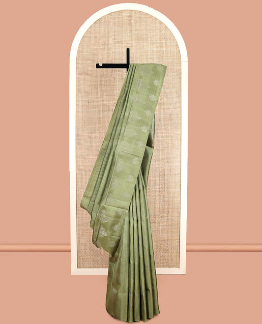 Green Mayuri Soft Silk Saree, Subtly Sparkled with Buttas, a Zari Border, Sparsely Woven Pallu, and a Matching Blouse