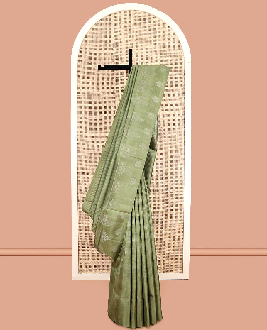 Green Mayuri Soft Silk Saree, Subtly Sparkled with Buttas, a Zari Border, Sparsely Woven Pallu, and a Matching Blouse
