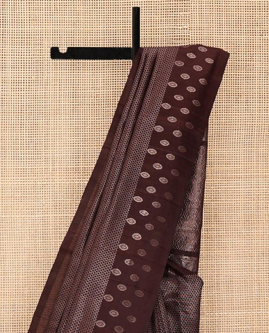 Brown Mayuri Soft Silk Saree, Beautifully Bedecked with Jaal Patterns All Over Its Body, Subtle Woven Border, Sparsely Woven Pallu of Ogee Patterns, and Paired with a Matching Blouse